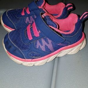 Pink and blue tennis shoes